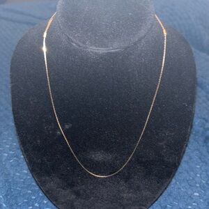 Victorian Era gold necklace adjustable by golden cuffs.